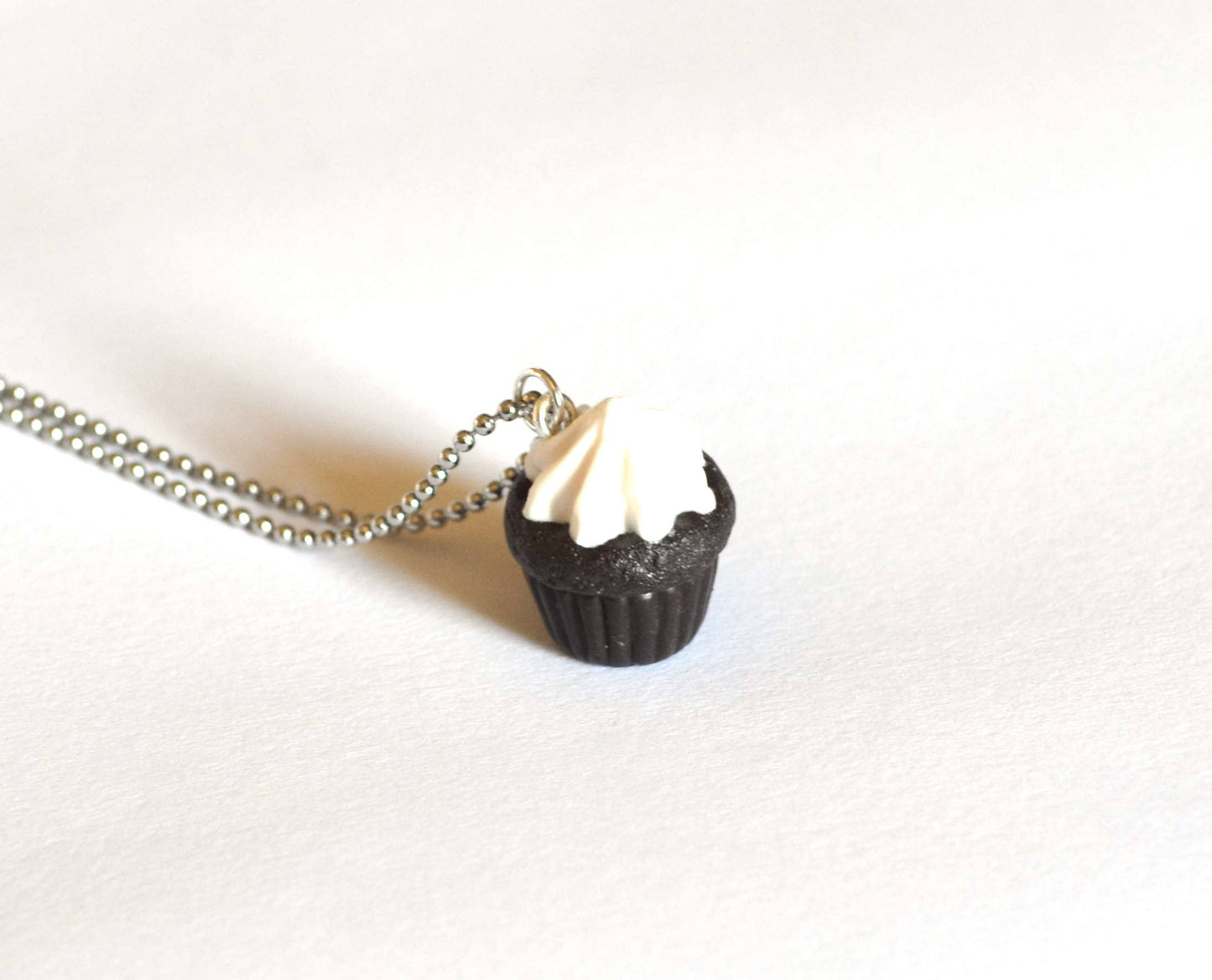 Dark Chocolate Cupcake With Marshmellow Frosting necklace